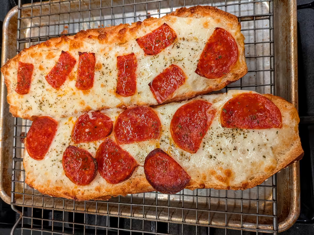 cheesy bread with pepperoni on both halves